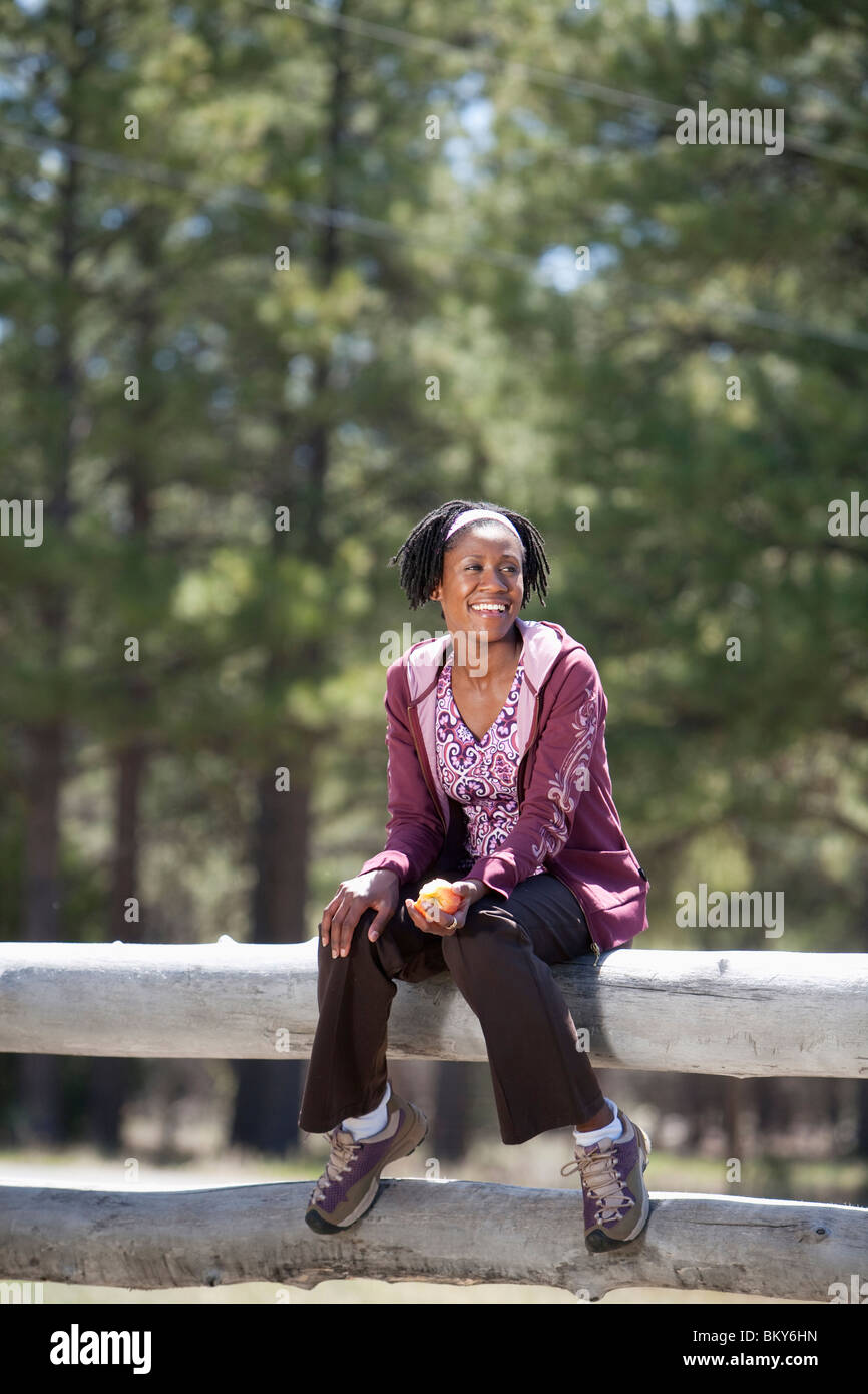 A woman rests during a run in New Mexico. Stock Photo