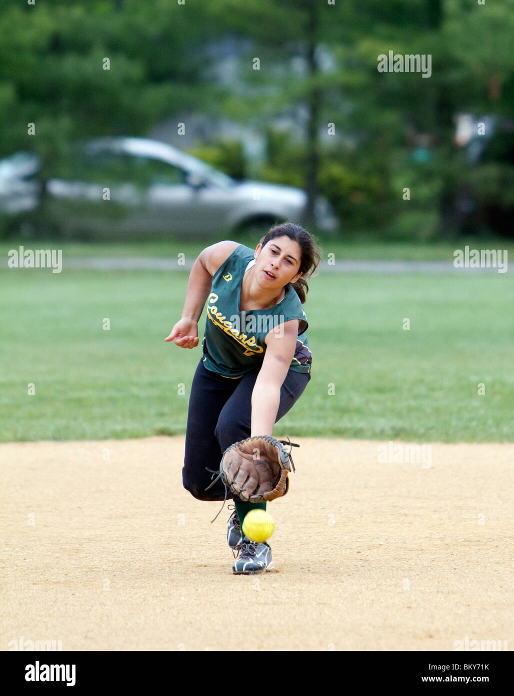 Girls high school softball. Catching running throwing. Teenage girls
