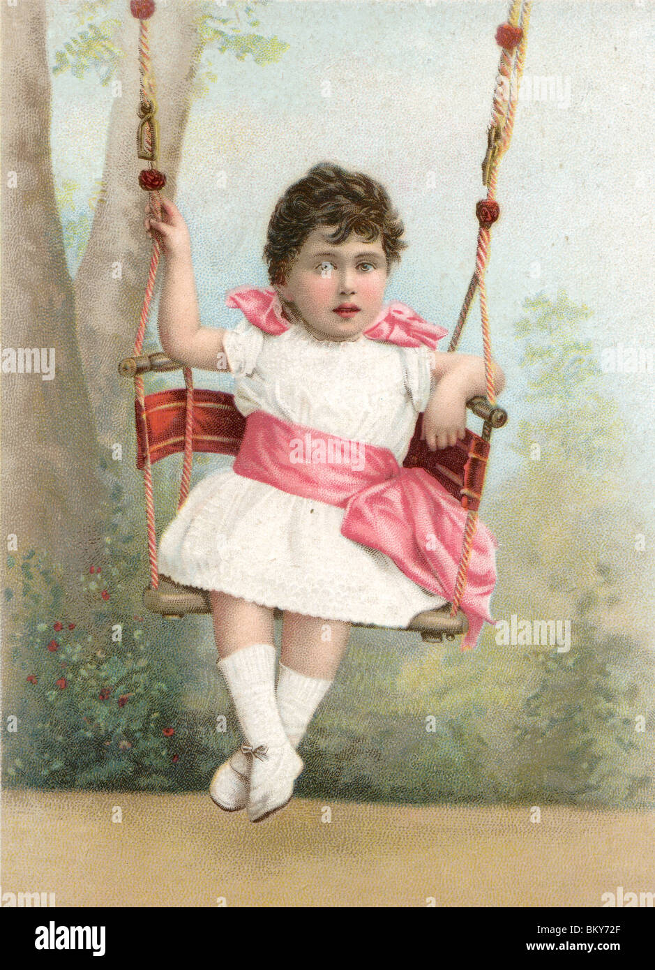 Young Girl on the Garden Swing Stock Photo