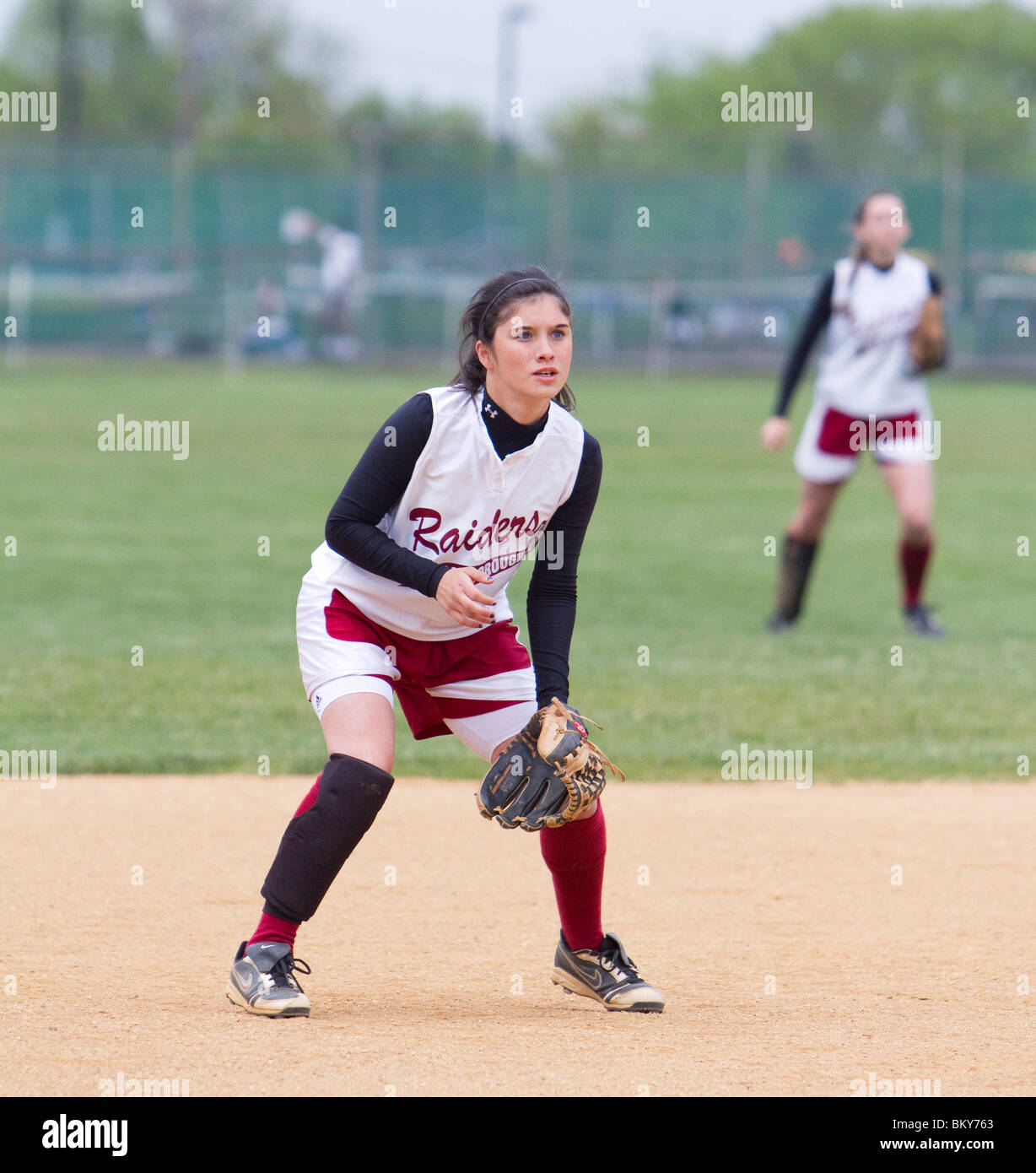 Girls high school softball. Catching running throwing. Teenage girls