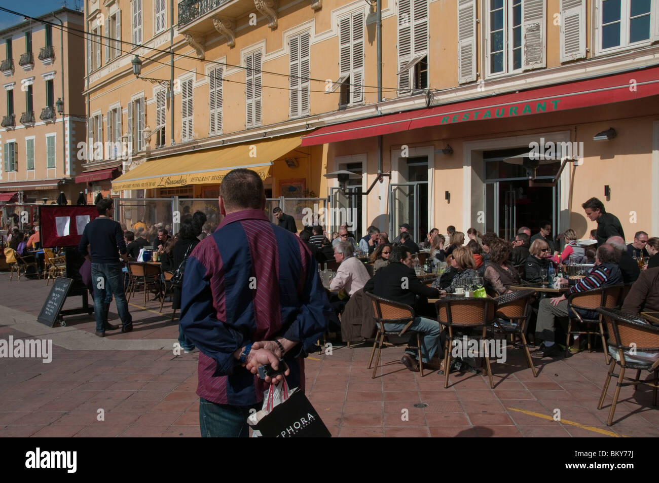 Nice, France, French Cafes, French Brasserie Restaurants, Sidewalk Crowded terrace street café scene Stock Photo