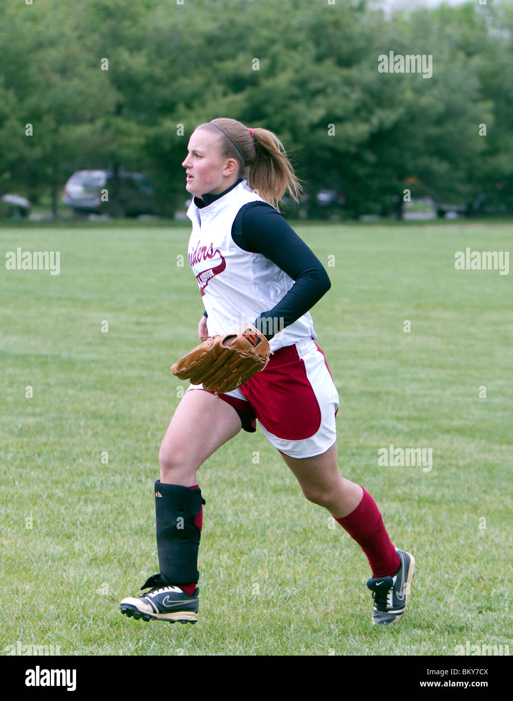 Girls high school softball. Catching running throwing. Teenage girls