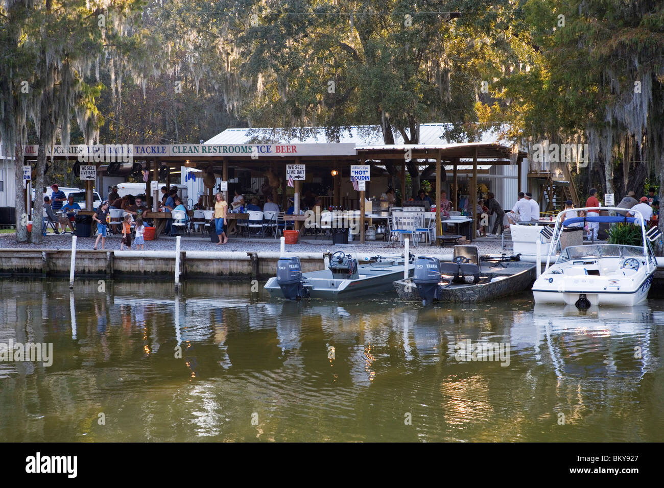 Barbecue party with Cajun live music at a gas station for boats near Attakapas Landing on Lake Verret, near Pierre Part, Louisia Stock Photo