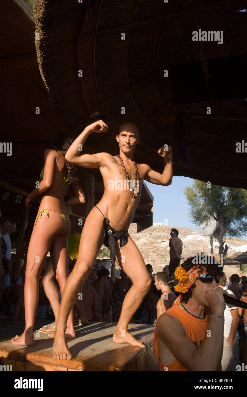 Man wearing a crazy thong in the Tropicana Club, Paradise Beach, Mykonos, Greece Stock Photo