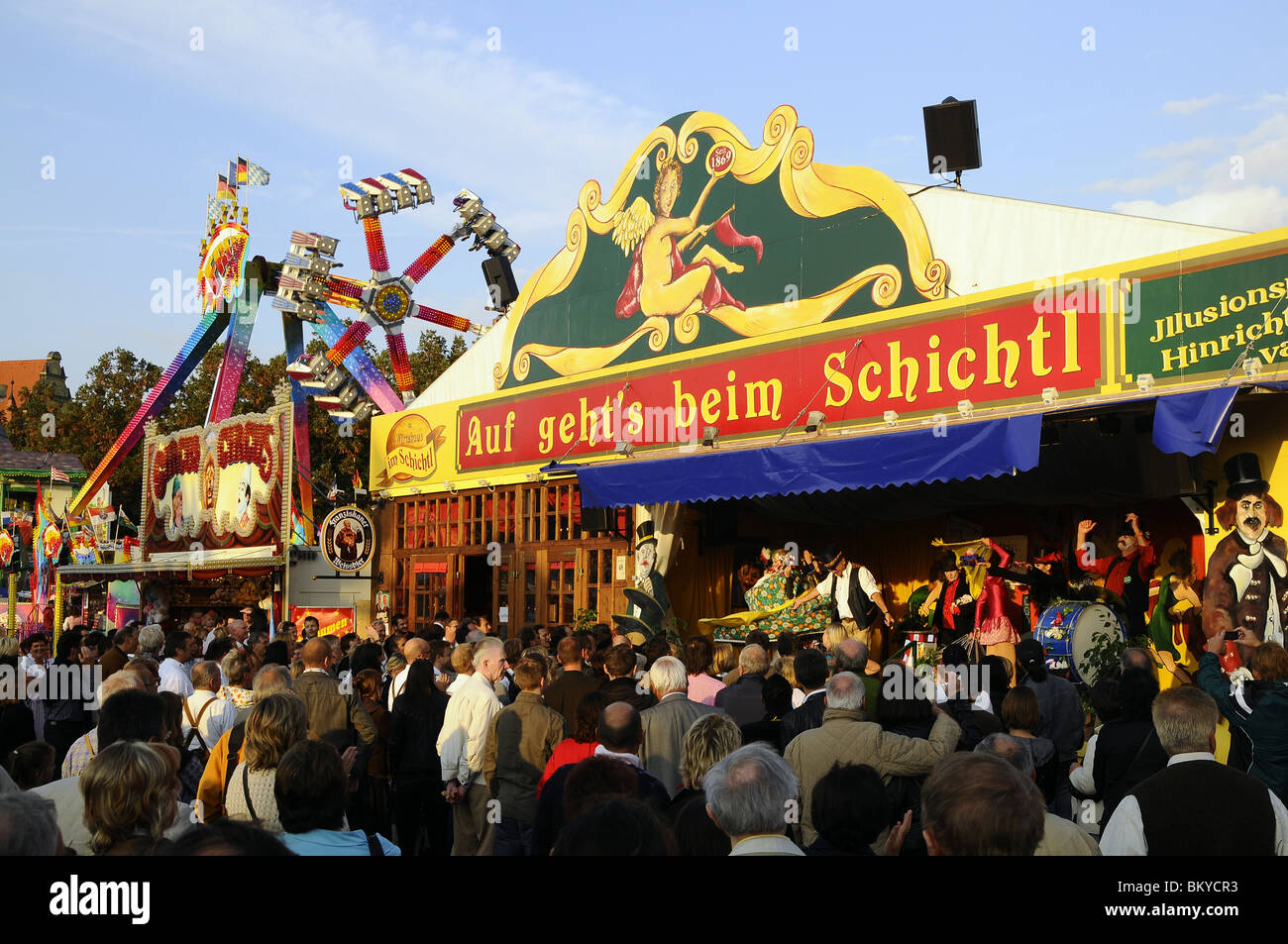 People in front of the show booth at Schichtl, Oktoberfest, Munich