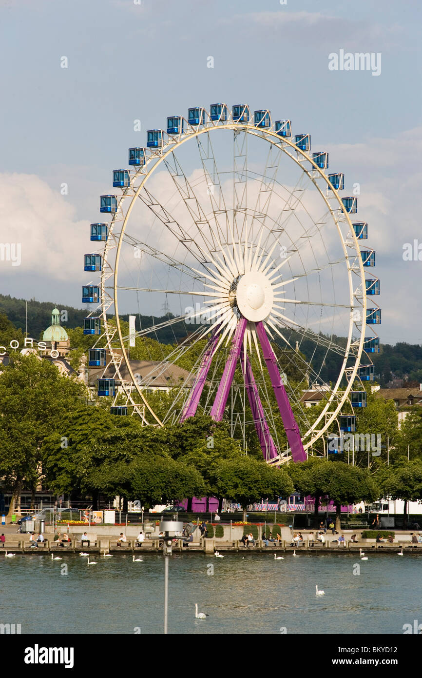 View over Lake Zurich to Ferris Wheel at Uto Quai, Zurich, Canton Zurich, Switzerland Stock Photo