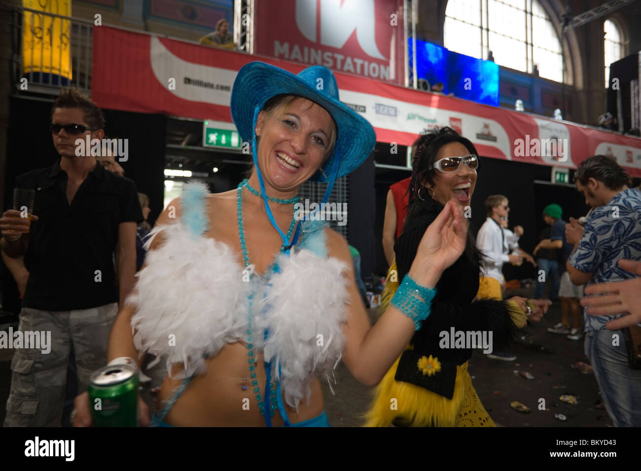 Raver, dressed in blue, dancing during an opening in the station, Street Parade (the most attended technoparade in Europe), Zuri Stock Photo
