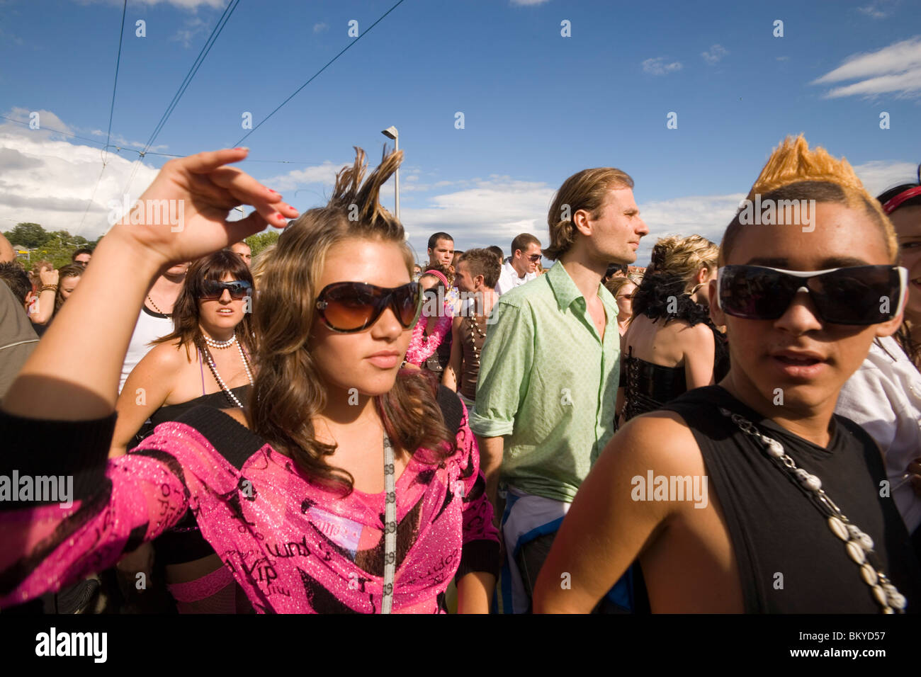 Portrait of a young man wearing big sunglasses at Street Parade (the most attended technoparade in Europe) near Quai Bridge, Zur Stock Photo