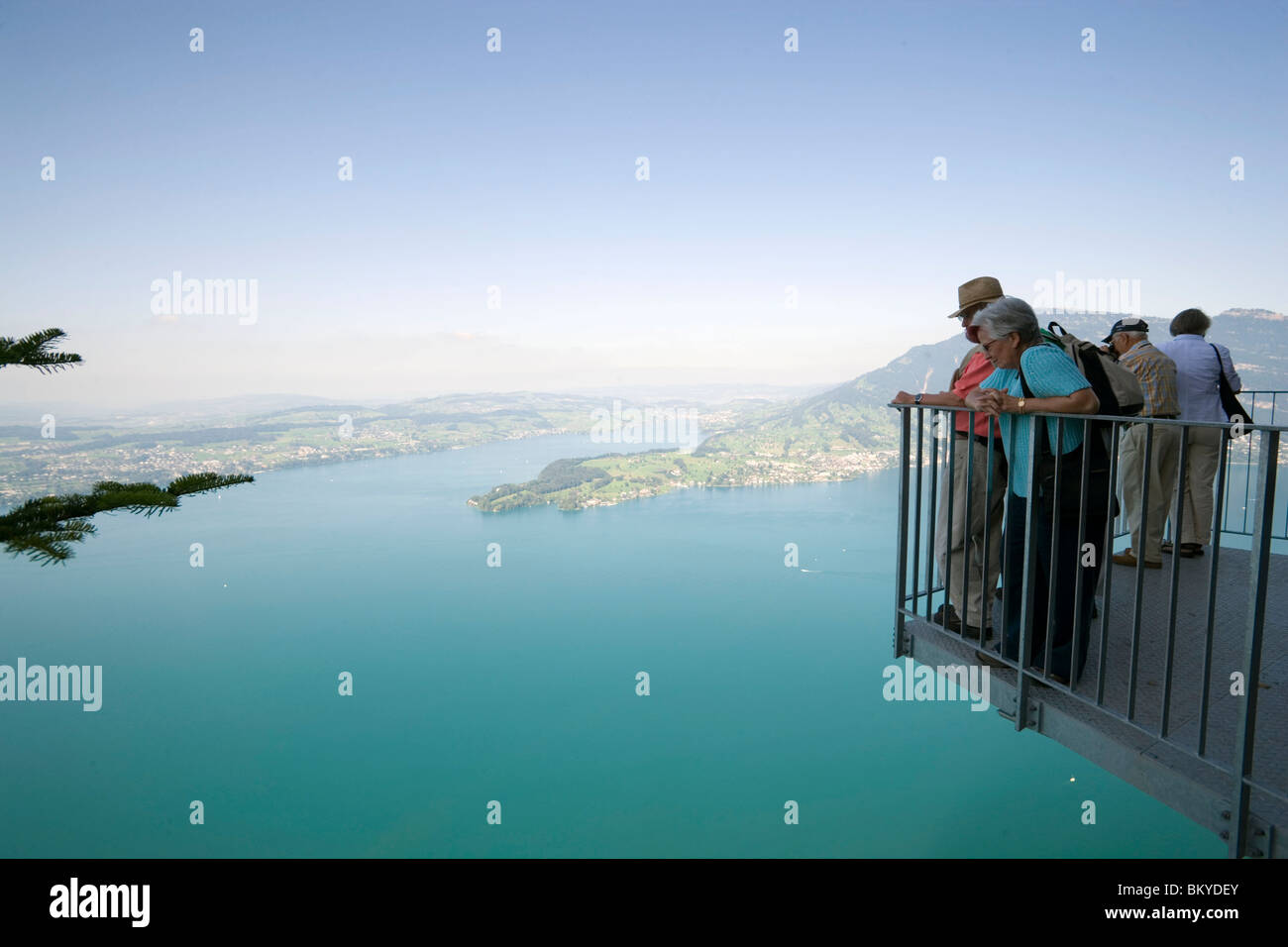 People standing at vantage point of Felsenweg and looking over Lake Lucerne, Buergenstock (1128 m), Buergenstock, Canton Nidwald Stock Photo