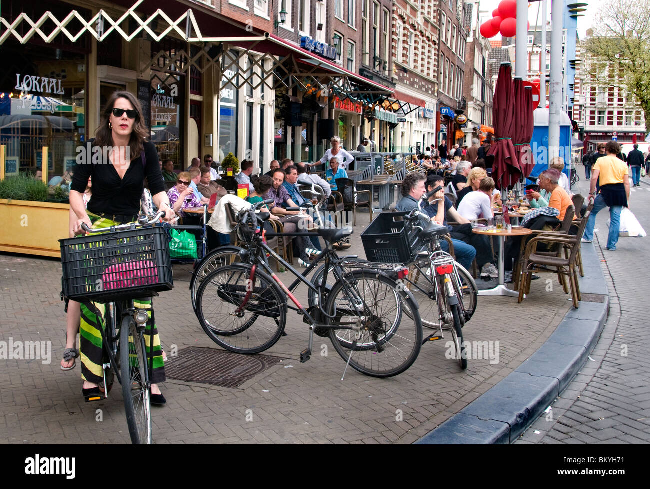 Woman Nieuwmarkt  Amsterdam Cafe Restaurant  bar pub Netherlands ( red light district ) Stock Photo