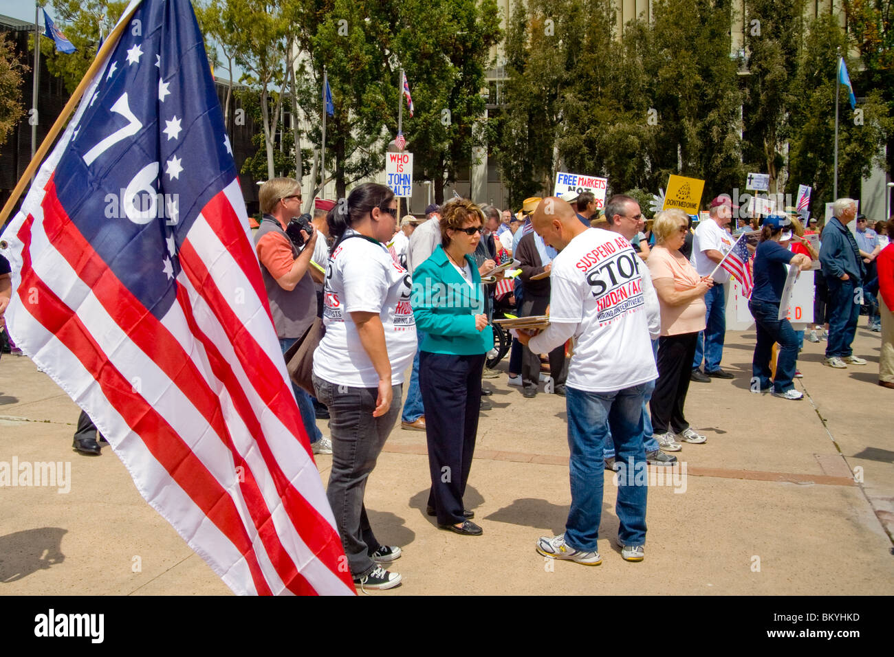 Protesters at a 'Tea Party' rally on April 15 (Tax Day) in Santa Ana, California. Note signs and American flag. Stock Photo