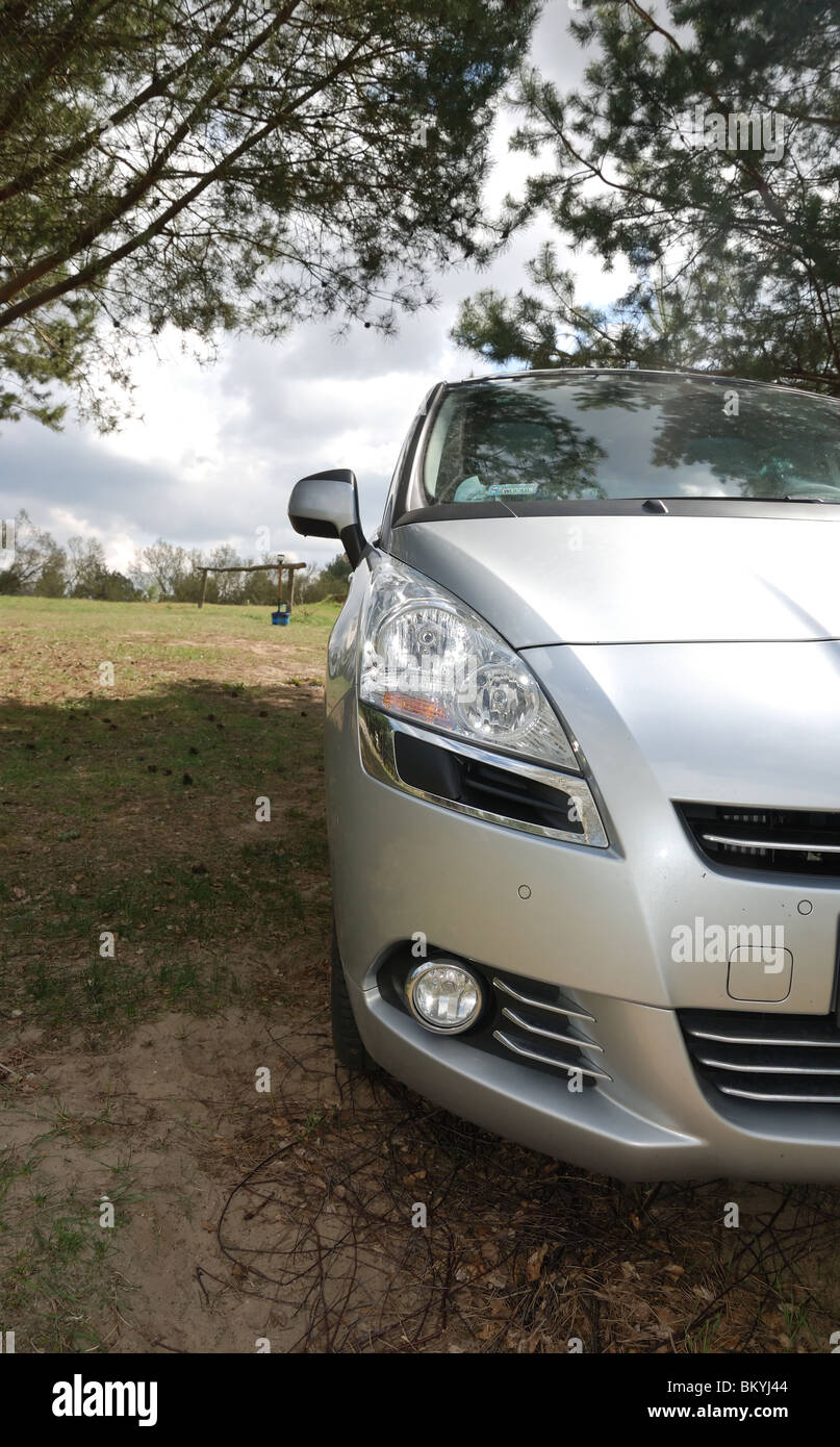 Peugeot 5008 1.6 THP - MY 2010 - silver metallic - five doors (5D) - French popular compact MPV (mini van) - in forest, meadow Stock Photo