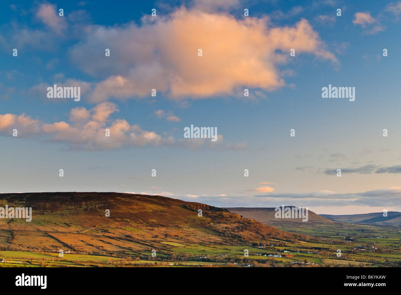 Colourful sunset over Keady Mountain near Limavady in the Binevenagh region of County Derry, Northern Ireland Stock Photo