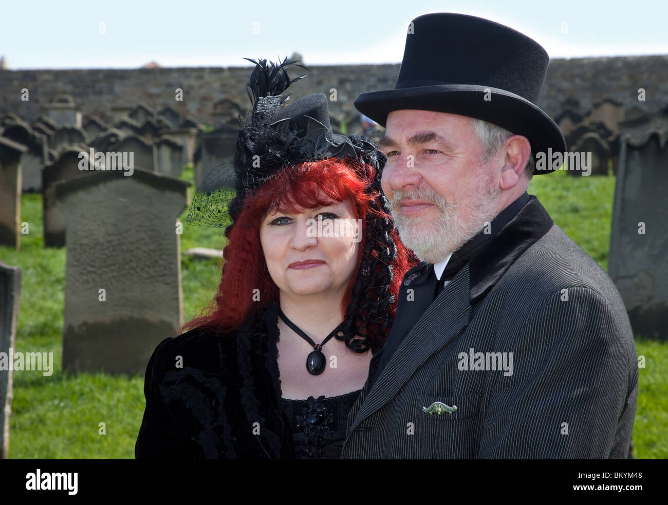 Family of Goths. Two woman and man, a family Gothic couples group all dressed in Victorian Costume at the Whitby Goth Festival, April 2010 Stock Photo