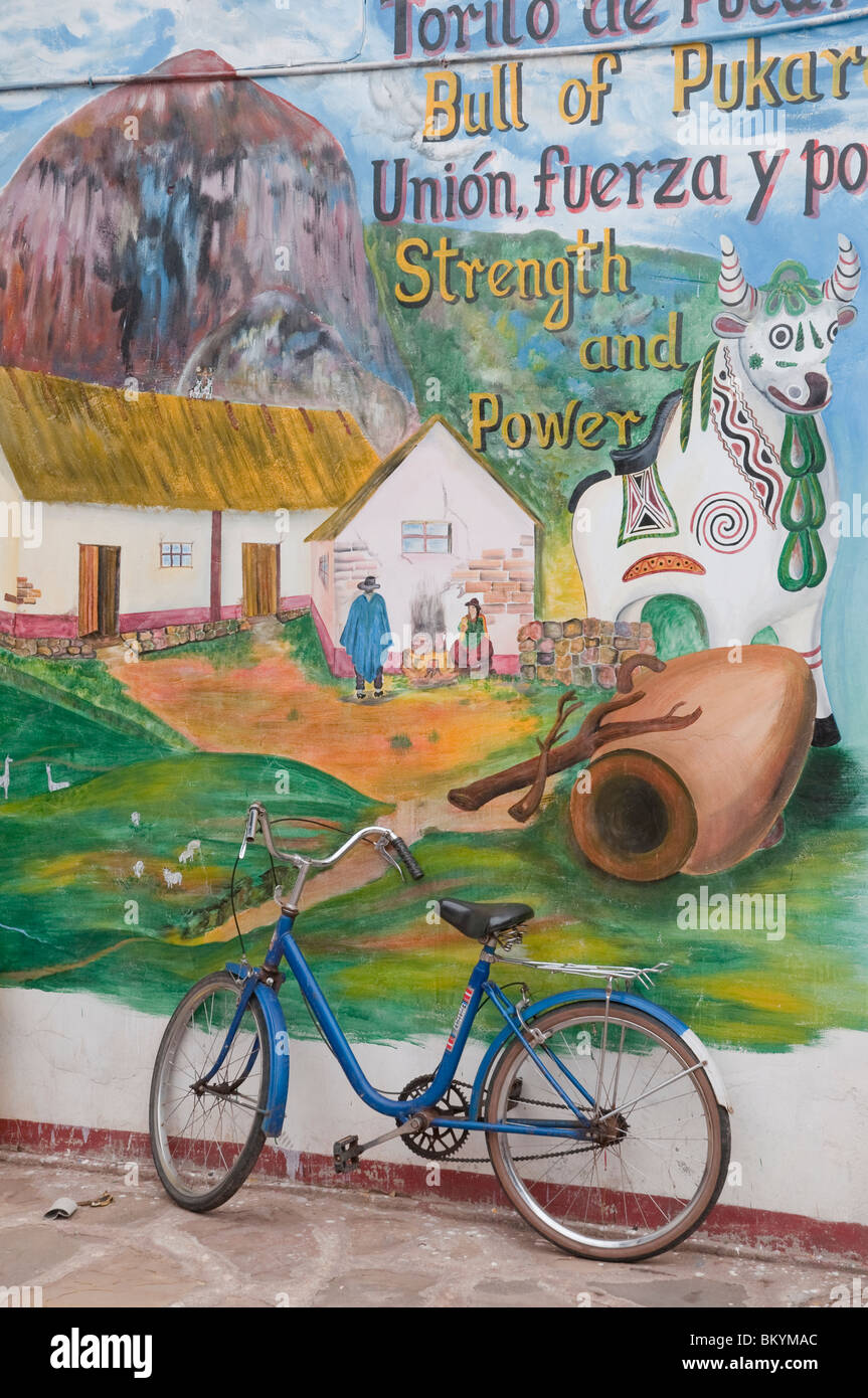 A bicycle and painted mural in rural Peru, South America. Stock Photo