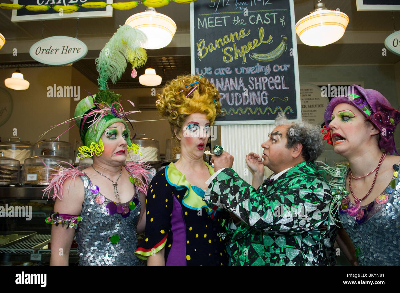 Cirque du Soleil performers promote the Banana Shpeel show at the Magnolia Bakery Stock Photo