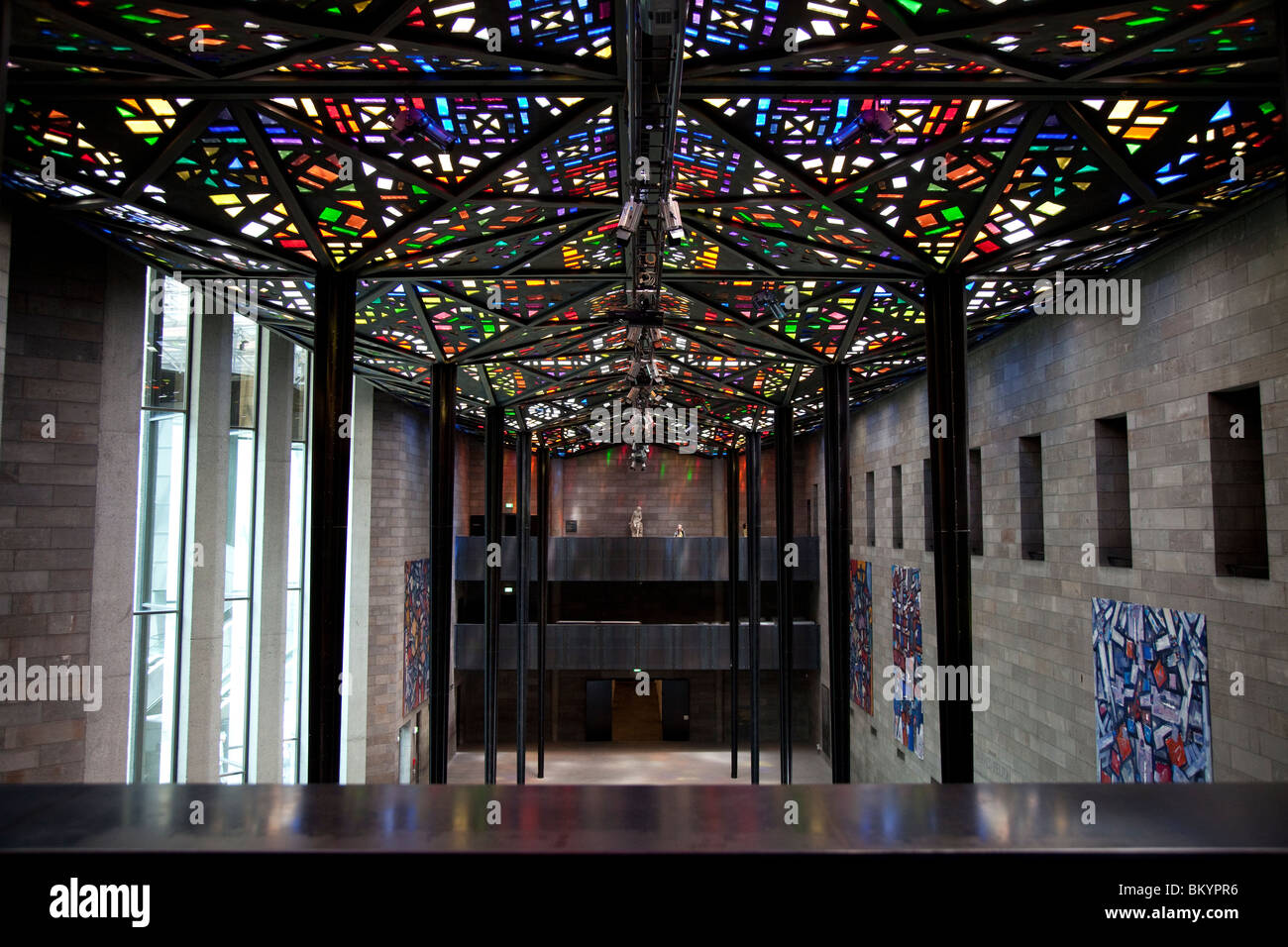 Multi Coloured Stained Glass Ceiling With Beams And Columns