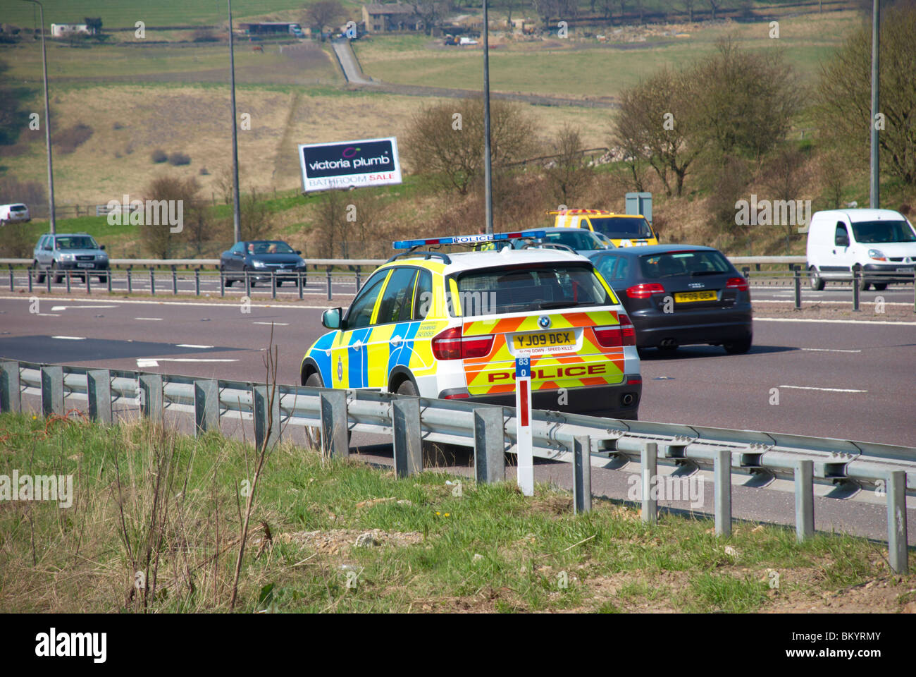 Police car on the M62 motorway. Stock Photo