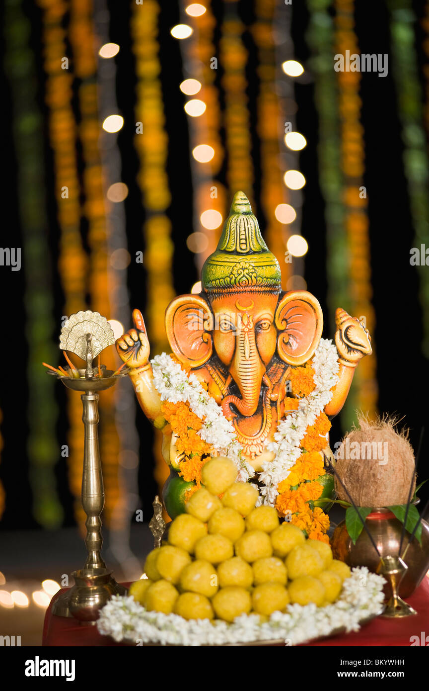 Religious offering in front of the Idol Lord Ganesha at Diwali Stock Photo