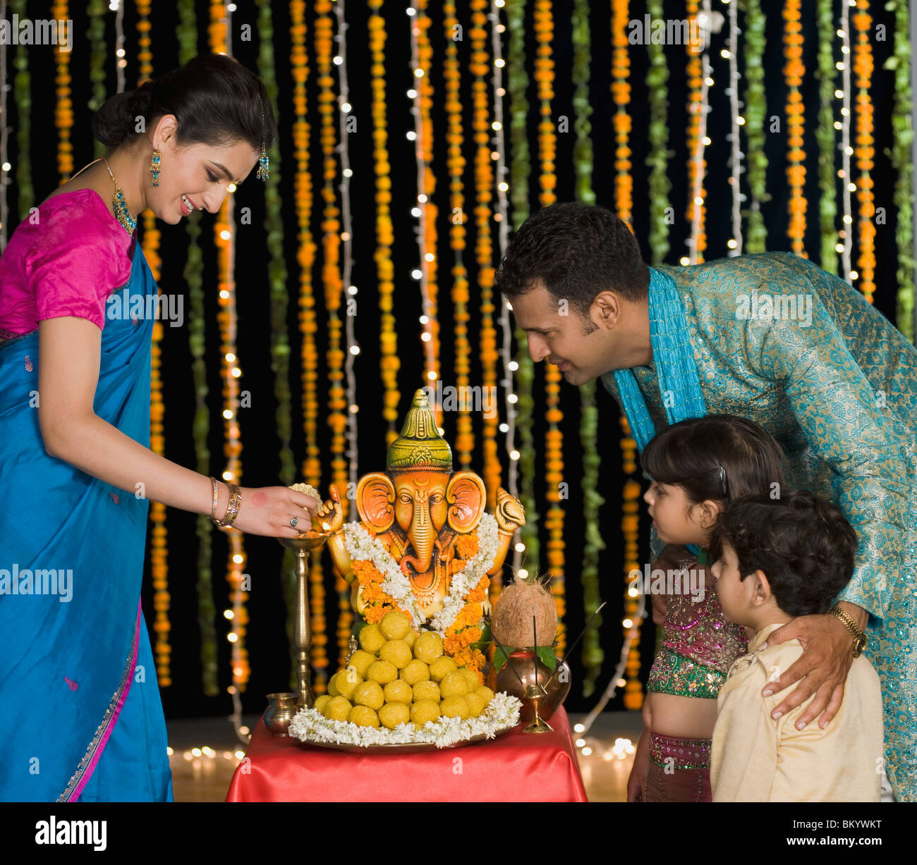 Family celebrating Diwali Stock Photo