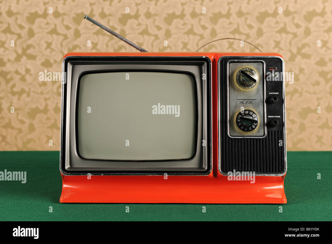 Orange vintage television in 1970s environment Stock Photo