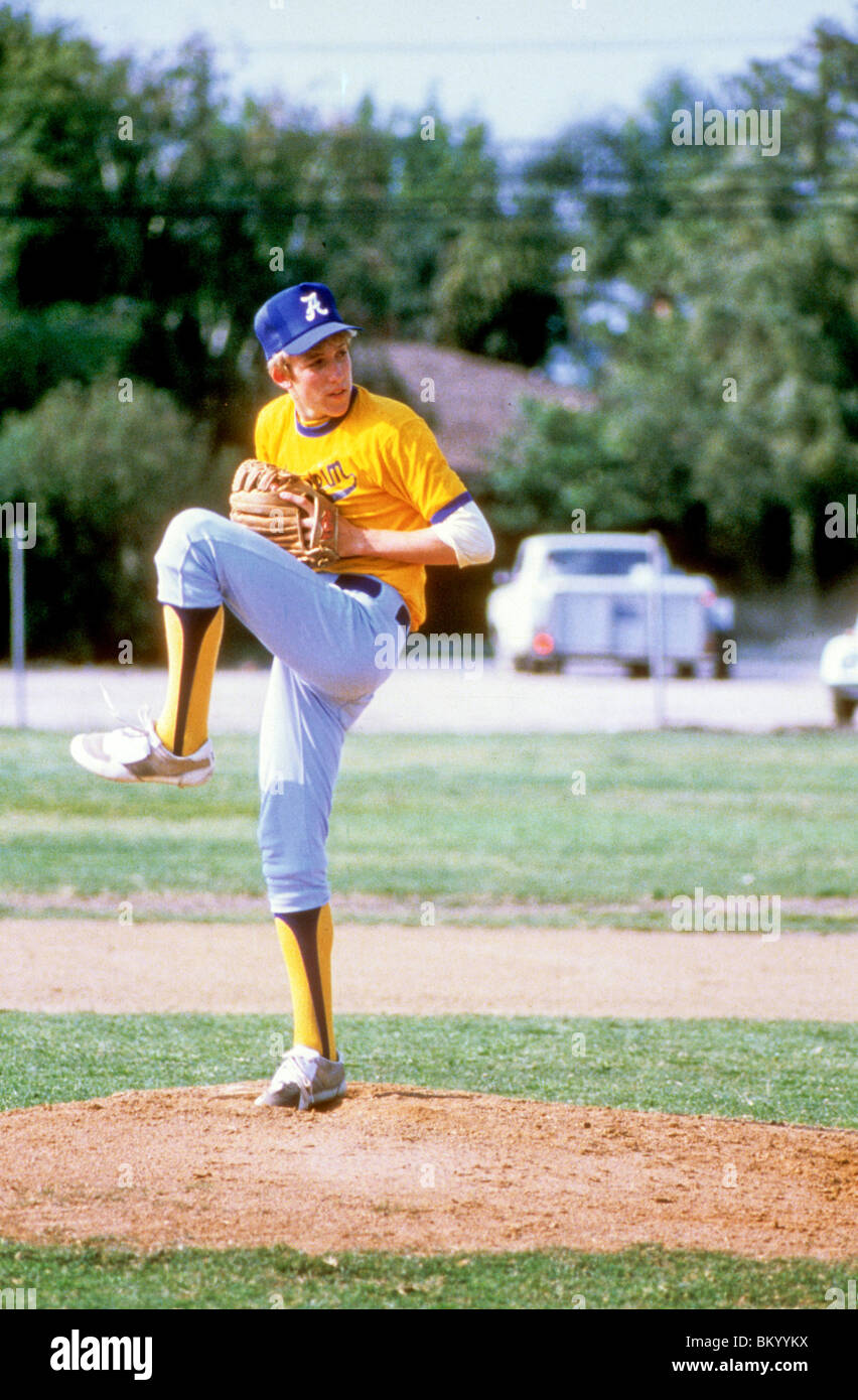 High school boy pitches baseball on mound Stock Photo Alamy
