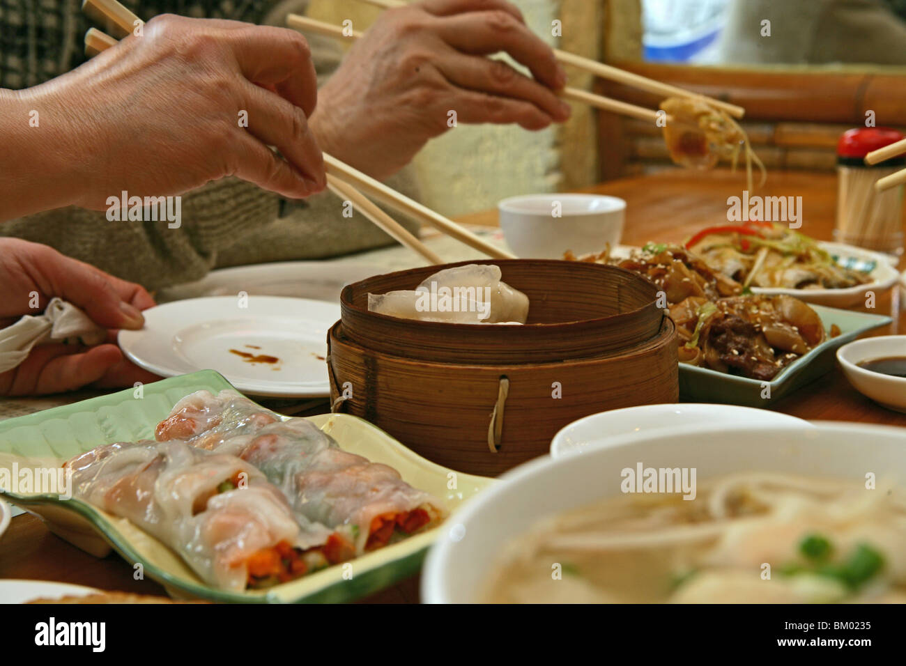 Dim Sum, Dim sum, steamed, buns, chopsticks Stock Photo - Alamy