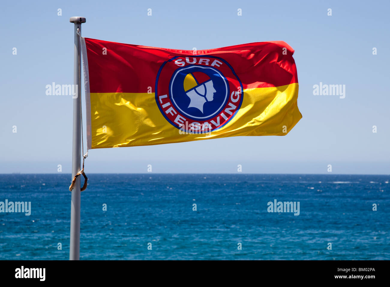 A surf life saving flag on Bondi Beach, Sydney coastline. Stock Photo