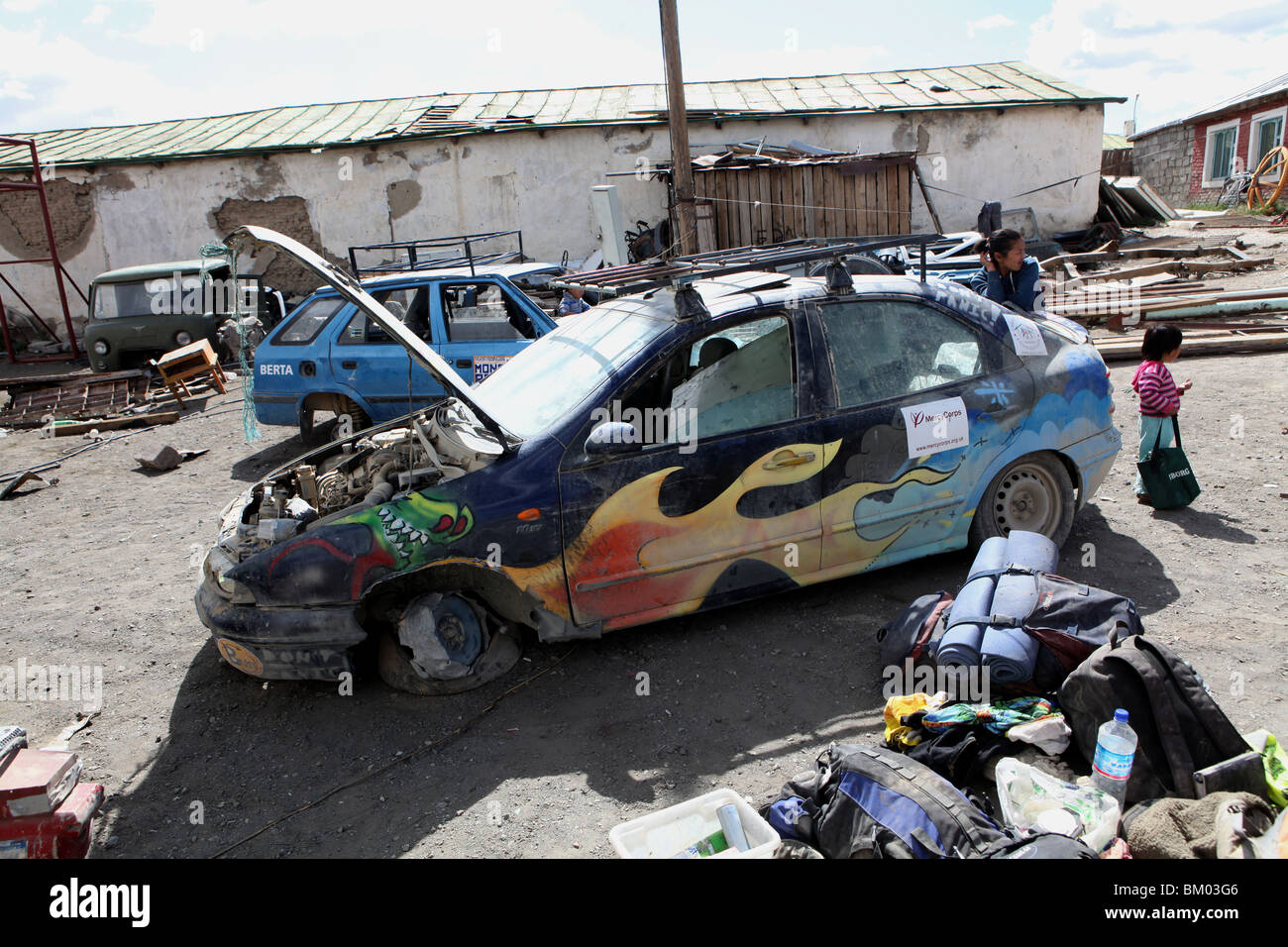 An abandoned car at a checkpoint during the 2009 Mongol Rally in Mongolia. Stock Photo