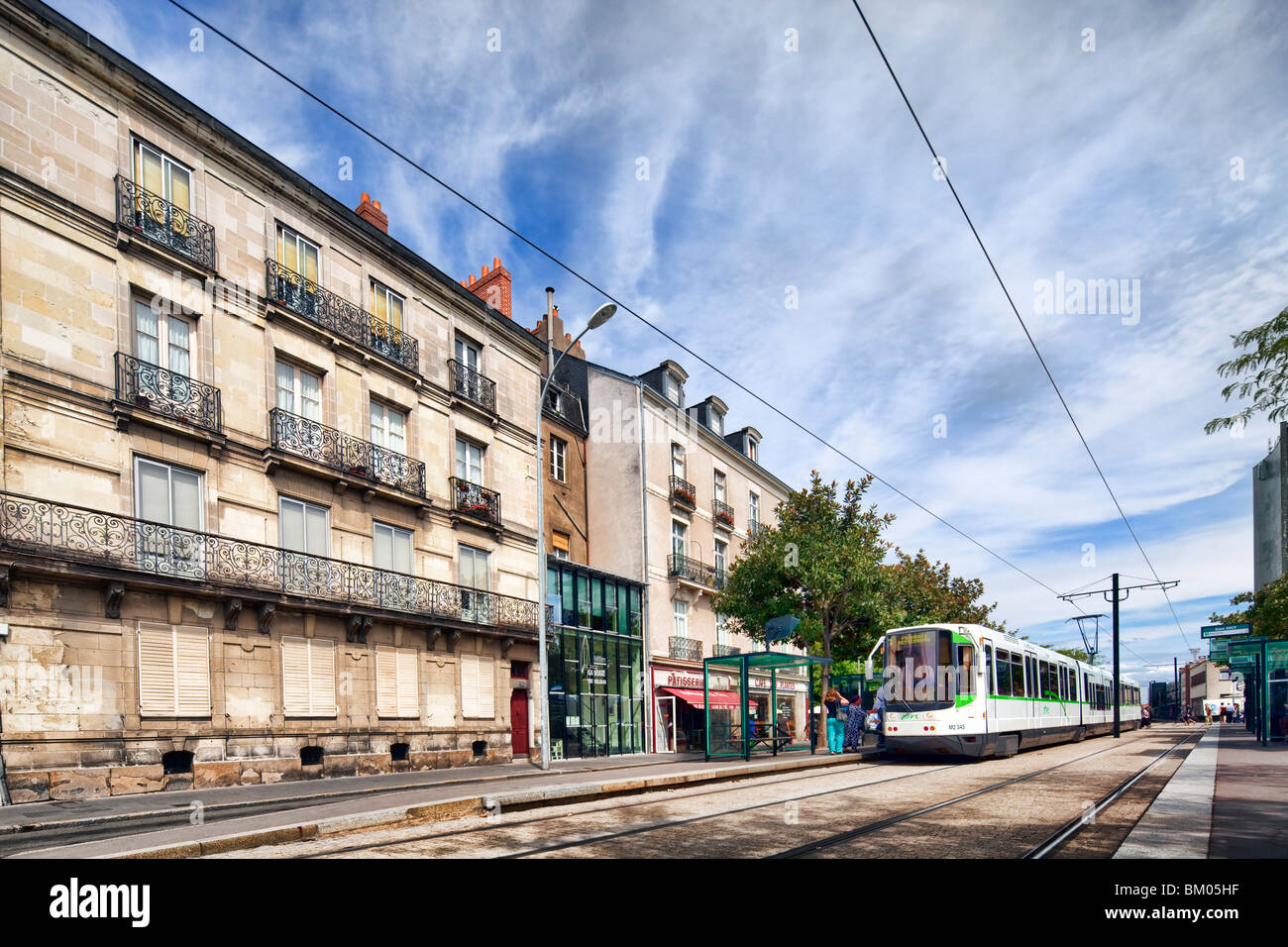 Tram in french street Stock Photo - Alamy
