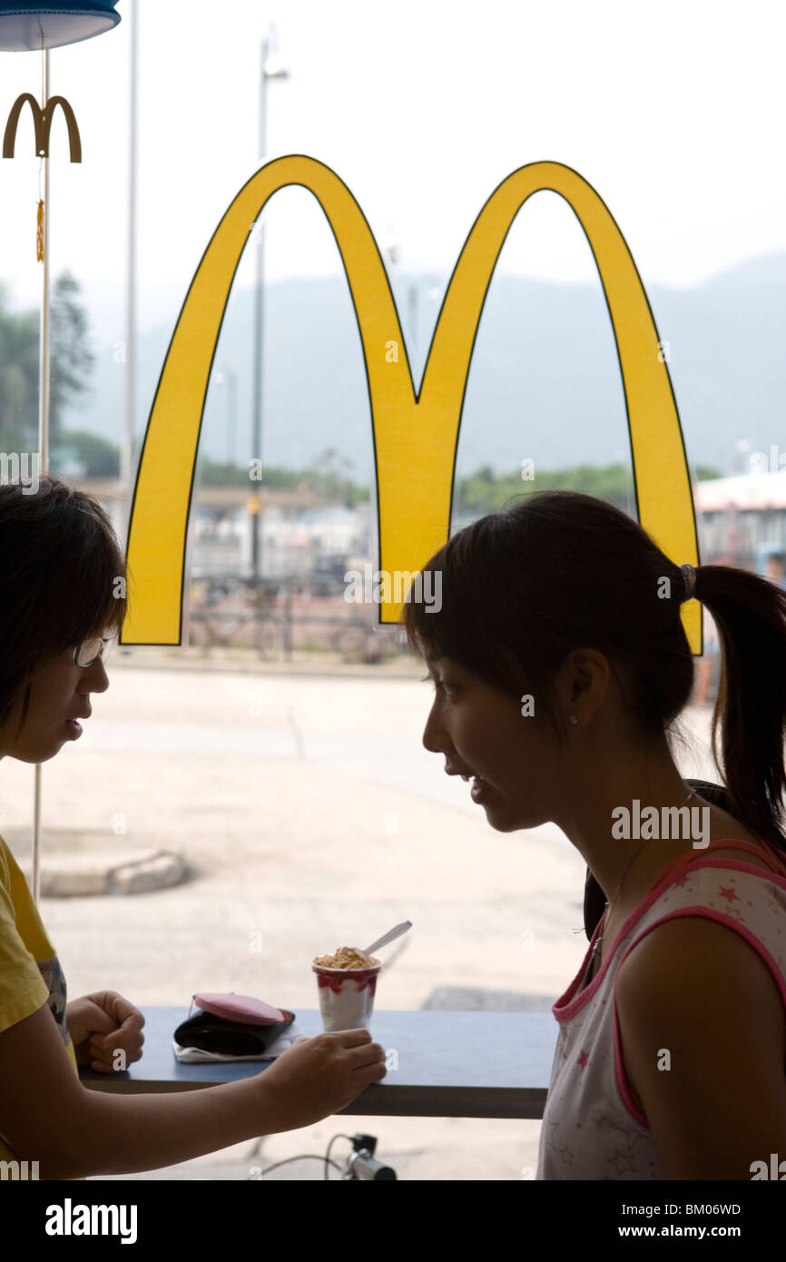 Teenagers at Hong Kong McDonald's, Lantau Island, Hong Kong Stock Photo