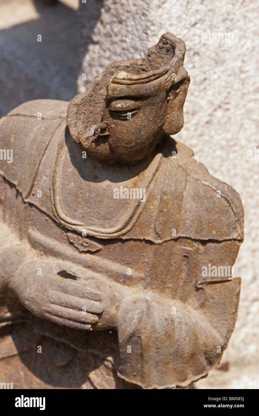 broken cast iron statue, destroyed during cultural revolution, monastery Hua Shan, Shaanxi province, Taoist mountain, China, Asi Stock Photo