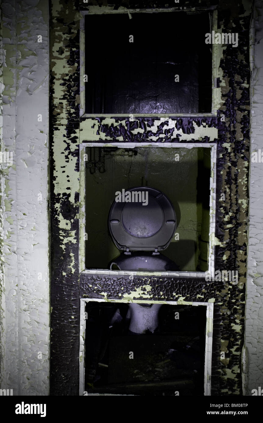 A disused toilet in an old abandoned factory in Potsdam Berlin Stock