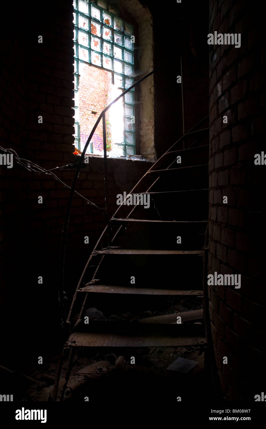 Old abandoned factory with metal staircase in Potsdam Berlin Stock Photo