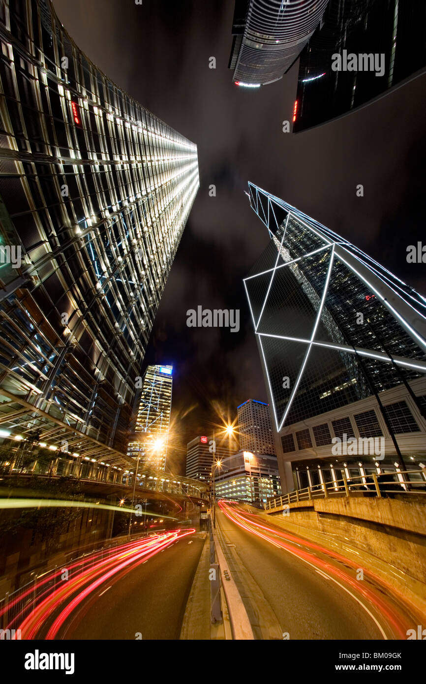Car trails and skyscrapers at night in Hong Kong Stock Photo
