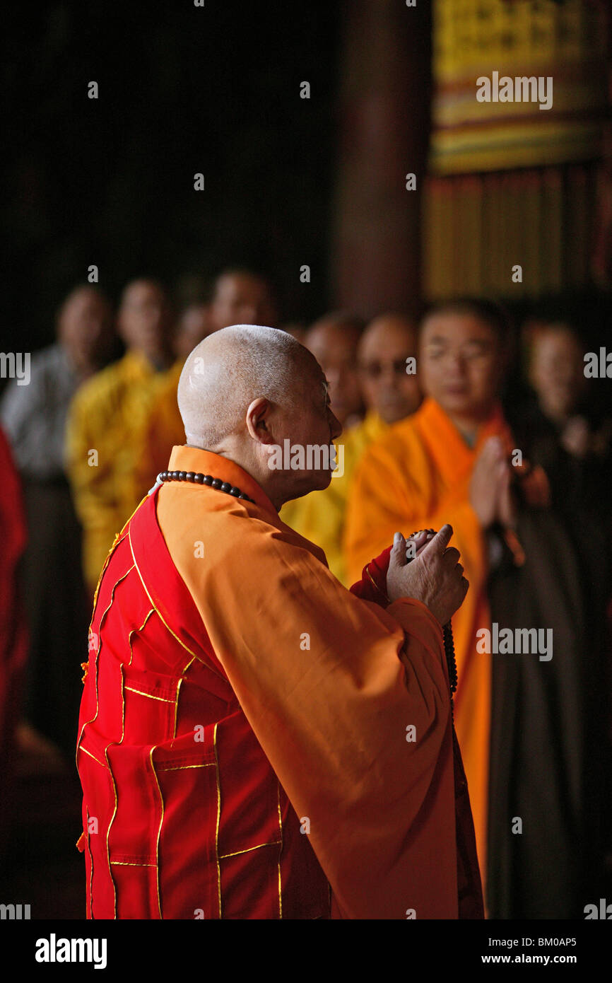 monk, abbot, prayer, Taihuai, Wutai Shan, Five Terrace Mountain, Buddhist Centre, town of Taihuai, Shanxi province, China, Asia Stock Photo