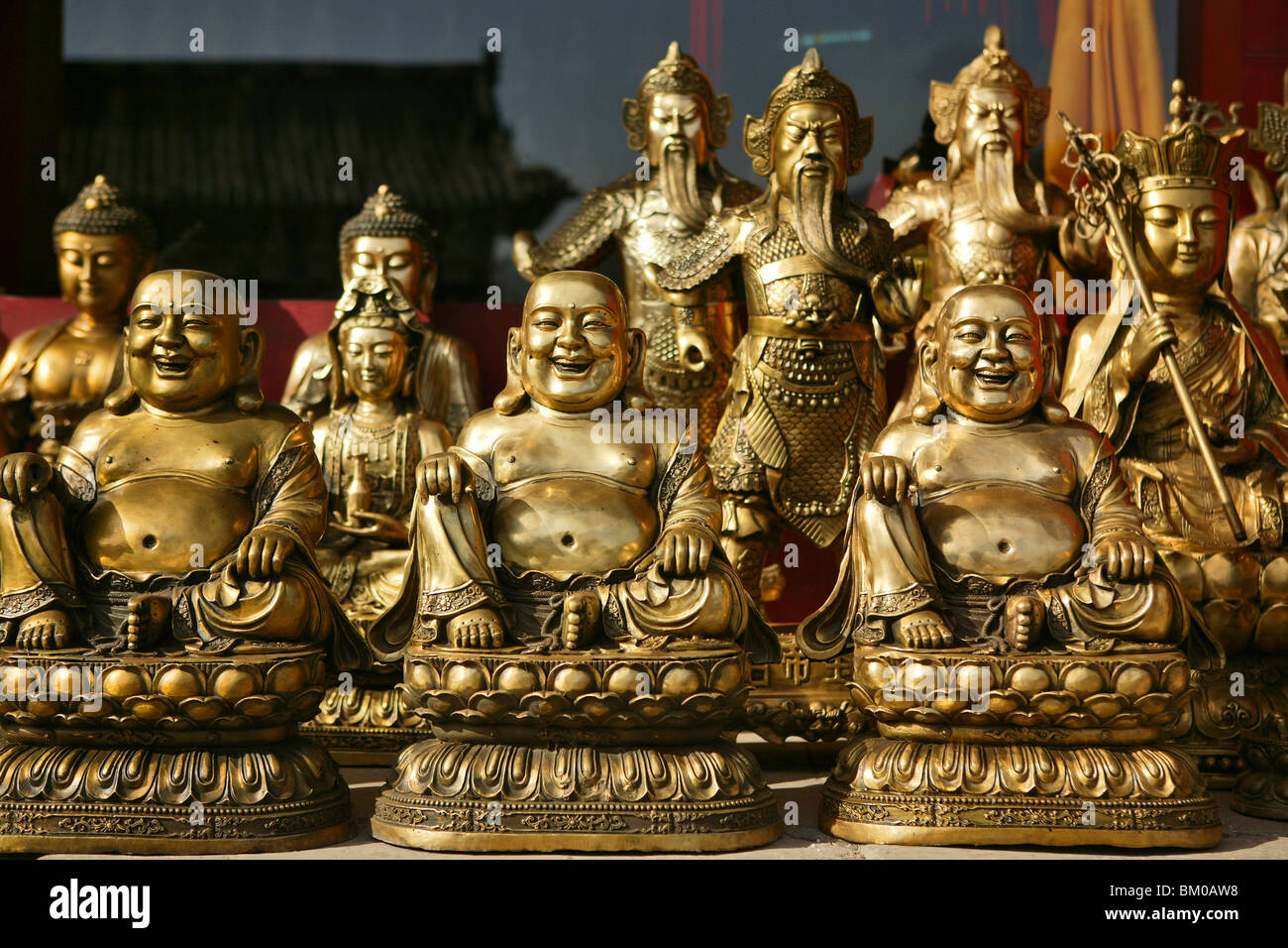 golden Buddha statues, shop in Taihuai, Wutai Shan, Five Terrace Mountain, Buddhist Centre, town of Taihuai, Shanxi province, Ch Stock Photo