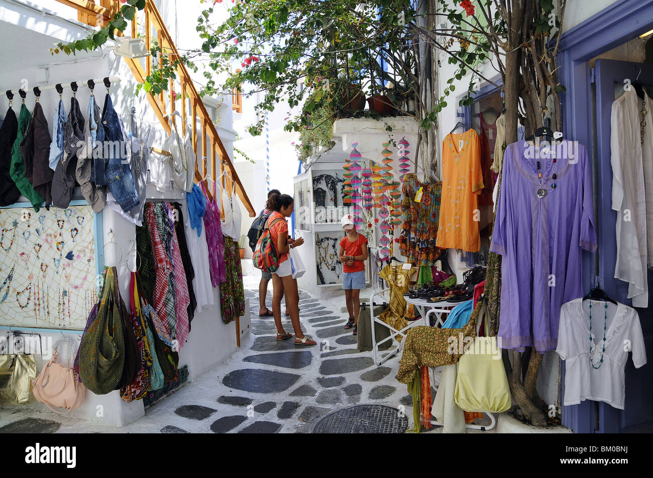 People in the narrow lanes of town, island of Mykonos, the Cyclades, Greece, Europe Stock Photo