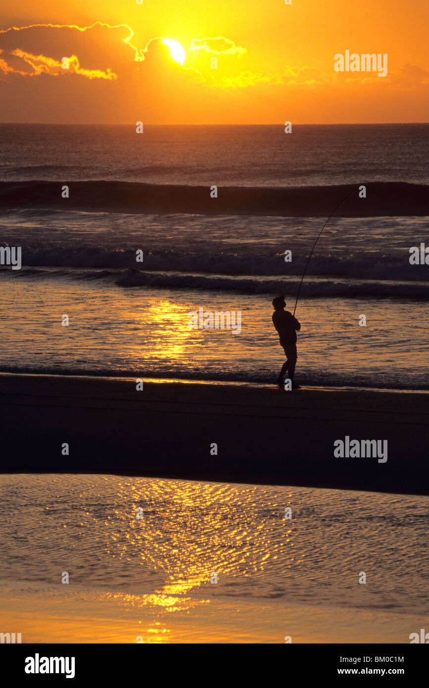 Fisherman at Sunrise, Fraser Island, Queensland, Australia Stock Photo