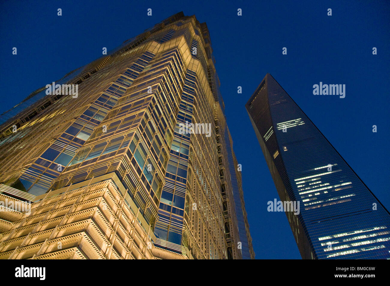 Low angle view at the illuminated Jinmao Tower, World Financial Center, EXPO Shanghai 2010, Pudong, Shanghai, China, Asia Stock Photo