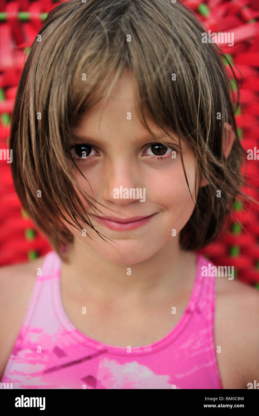 close portrait of a little girl looking at camera Stock Photo
