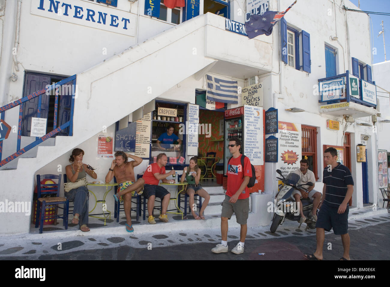Backpackers and Cafe, Mykonos, Cyclades Islands, Greece Stock