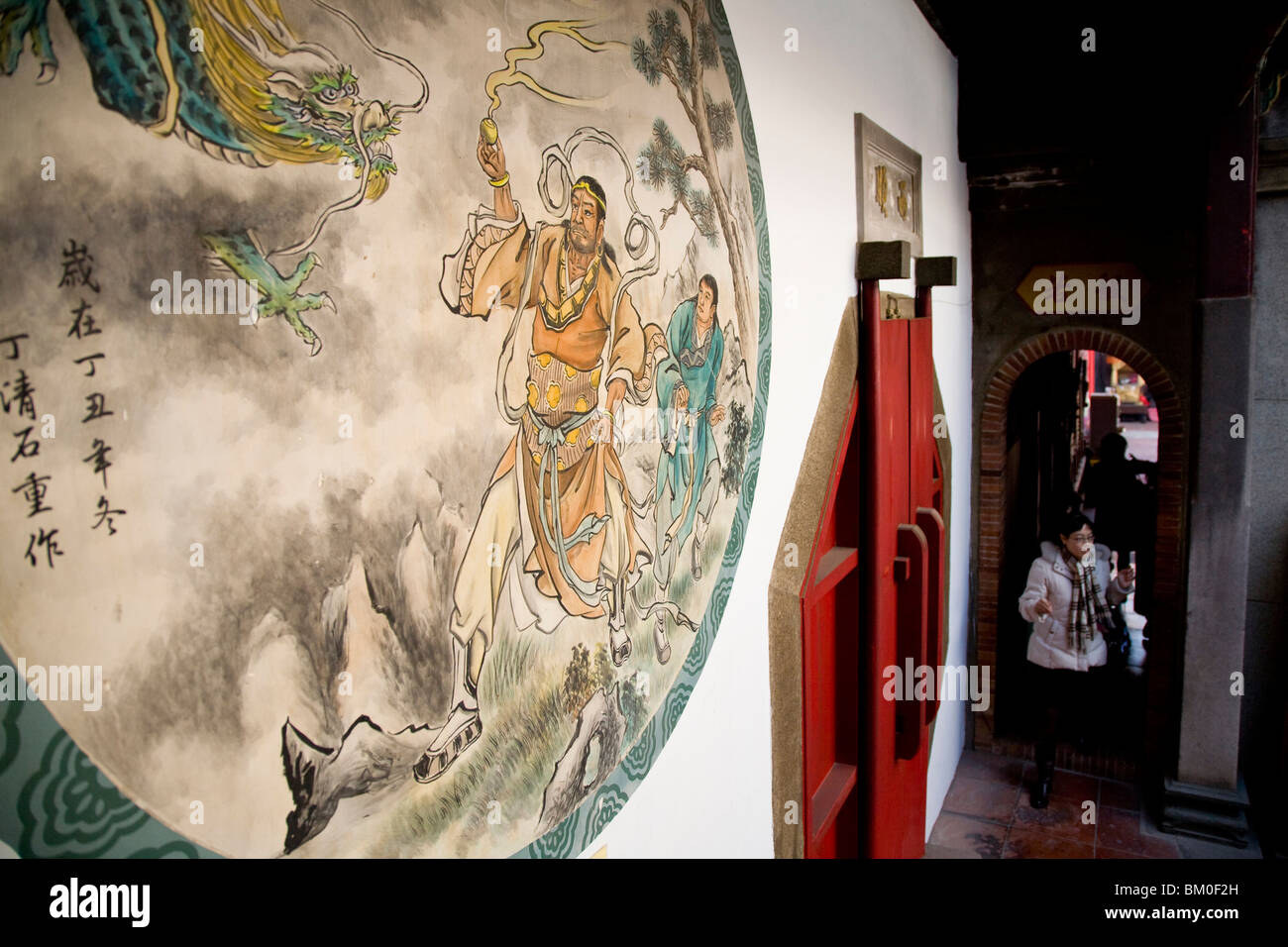 Mural and people at Matsu temple, Tainan, Republic of China, Taiwan, Asia Stock Photo