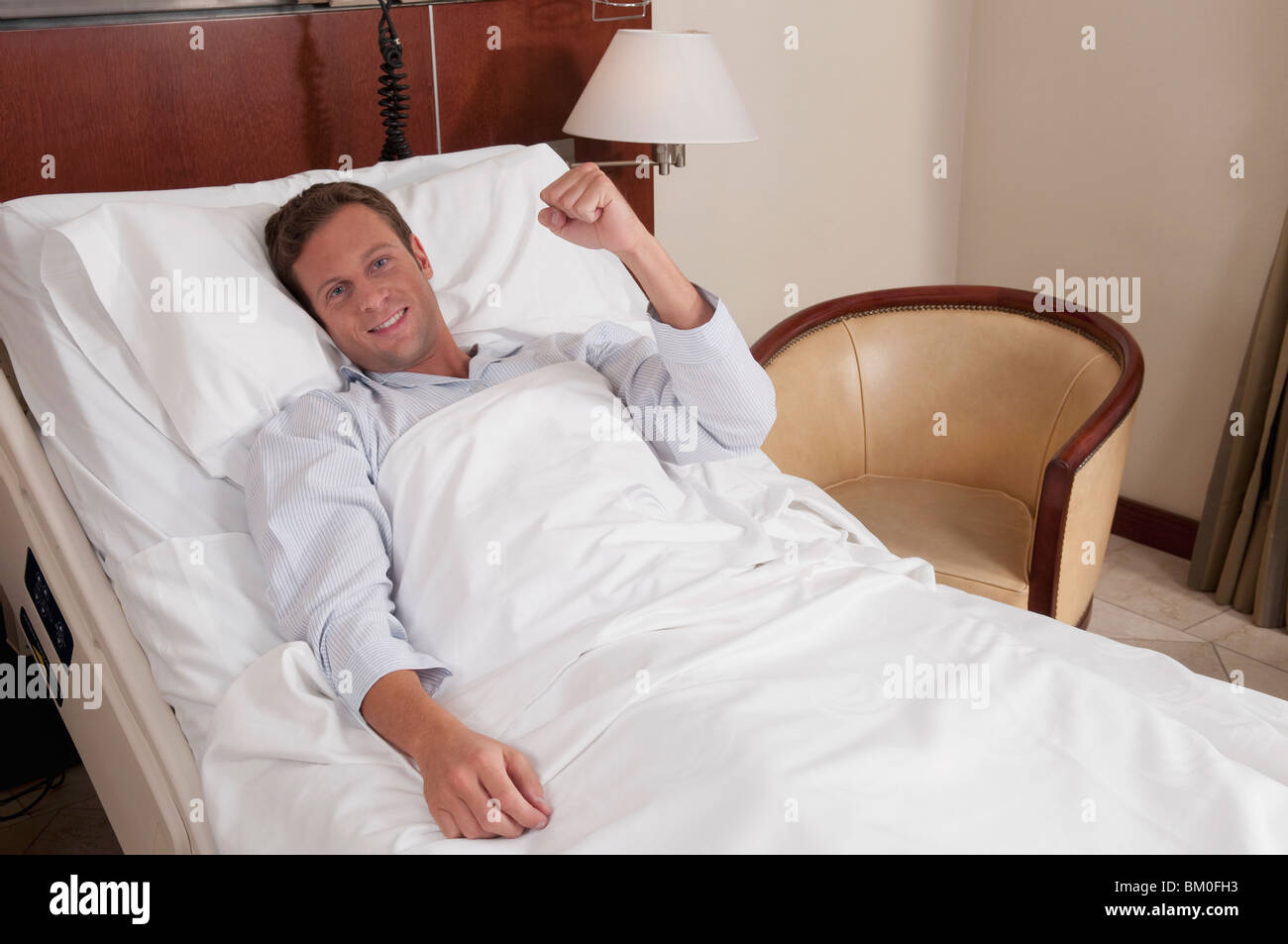 Man Lying In Hospital Bed High Resolution Stock Photography and Images ...