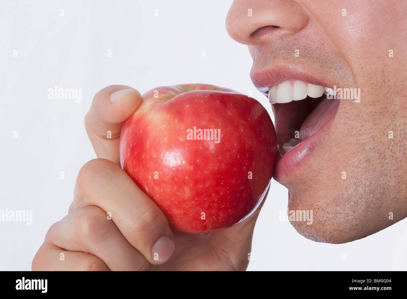 man-eating-an-apple-stock-photo-alamy