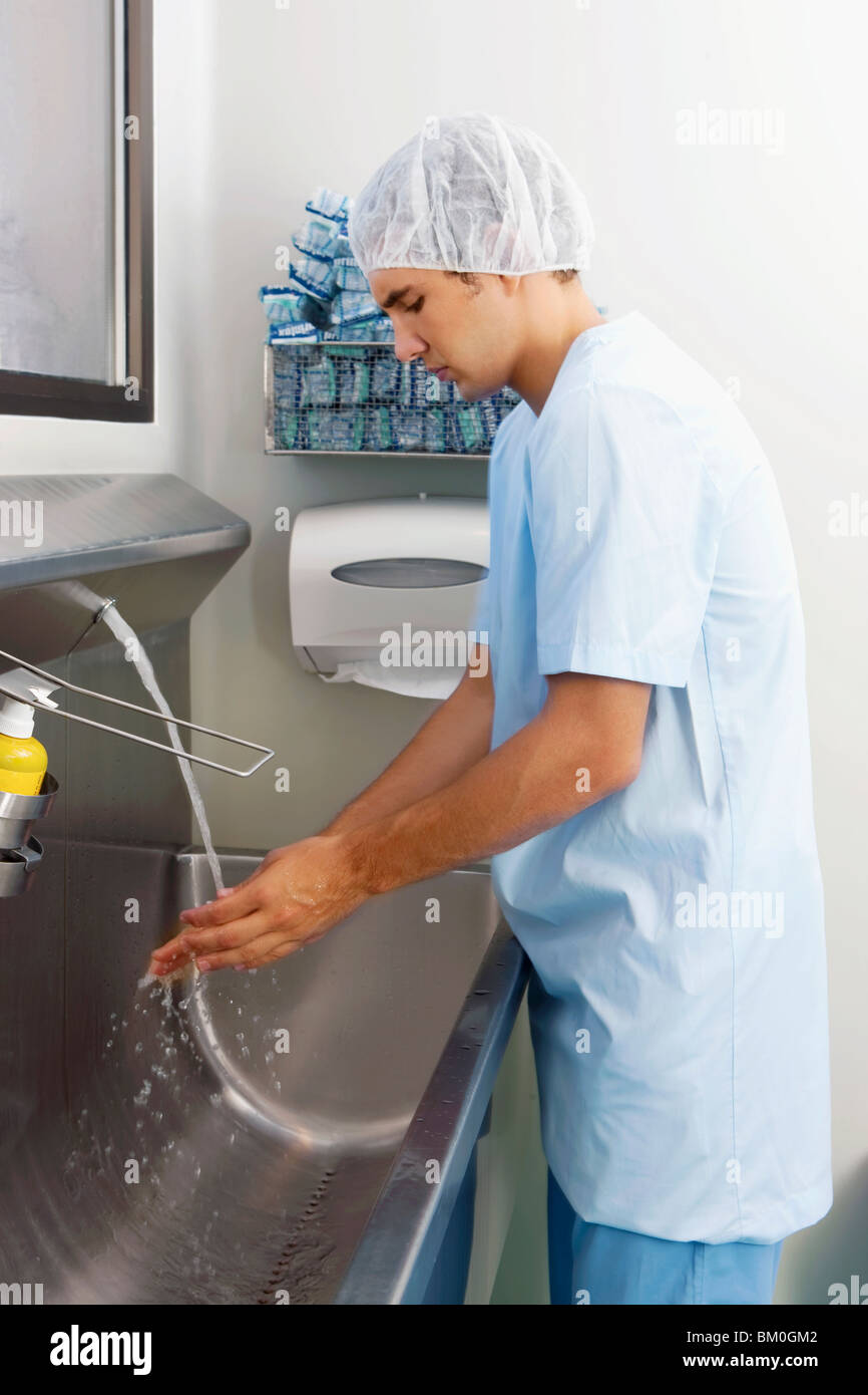 Surgeon washing hands Stock Photo Alamy