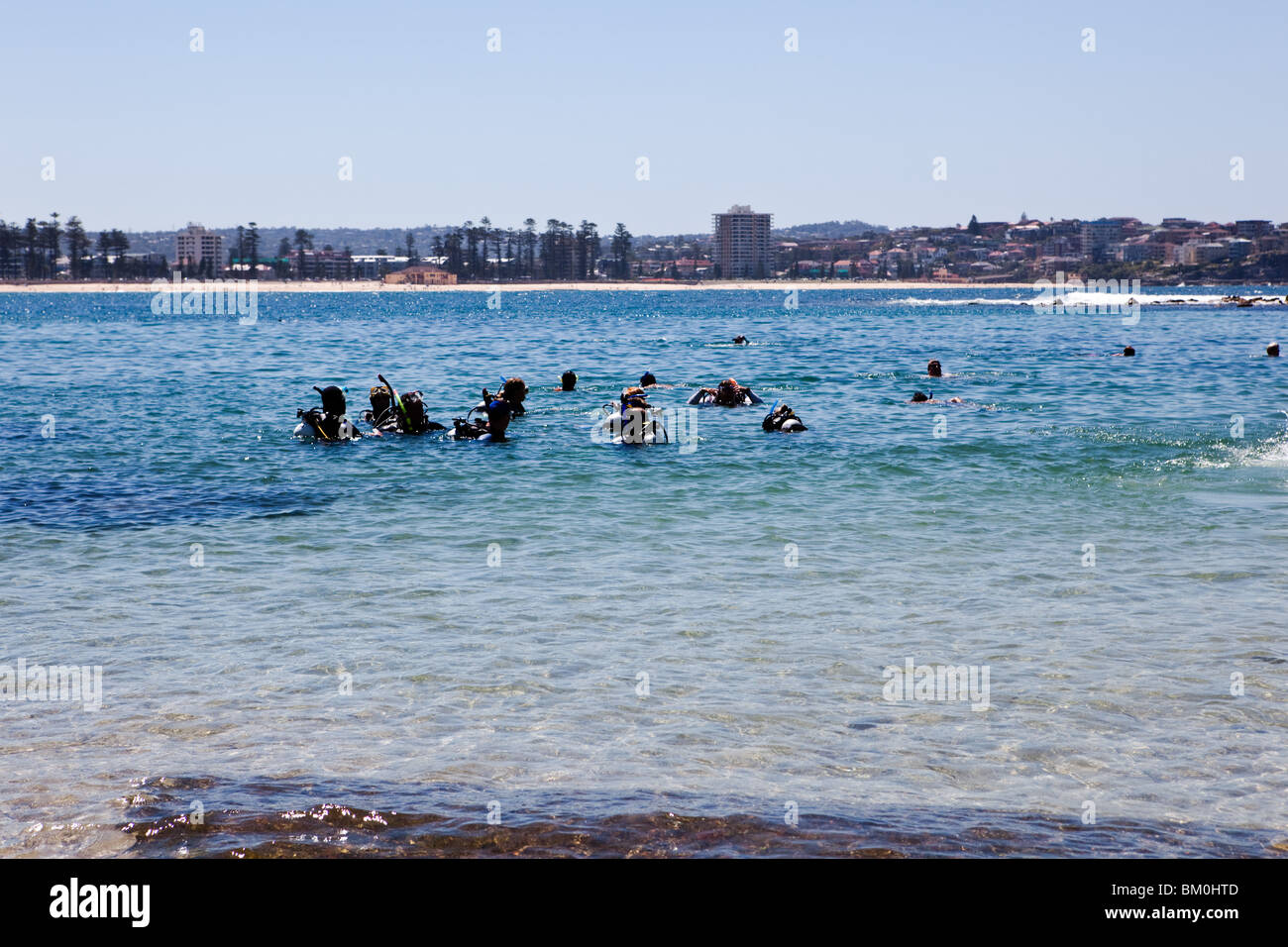 A diving class at Shelly Beach, with South Steyne beach in the background. Stock Photo