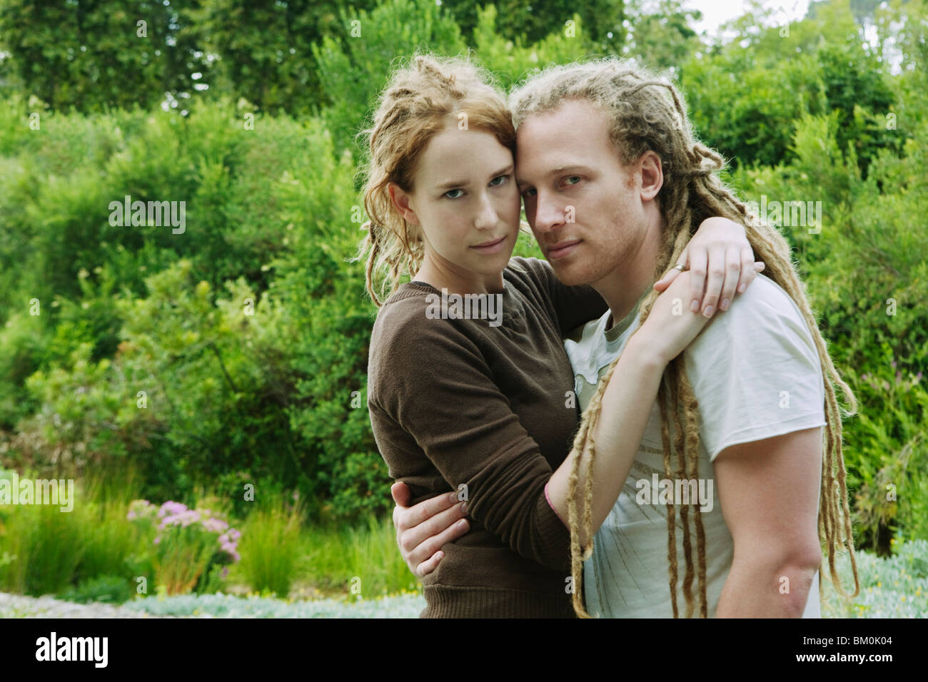 Man arm around woman hi-res stock photography and images - Alamy