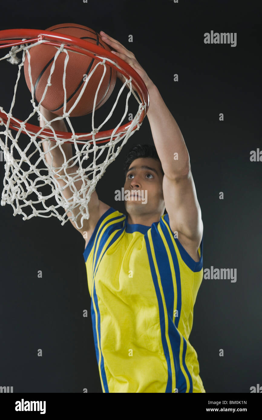 basketball player dunking