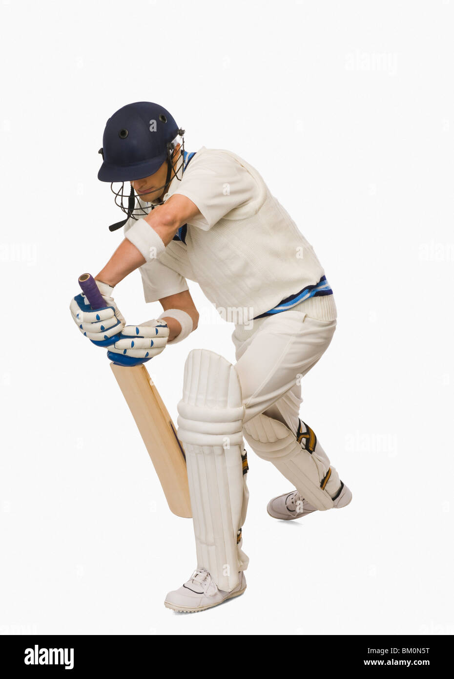 Cricket batsman playing forward defensive stroke Stock Photo 29520116